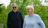Stables Owners smiling on deck