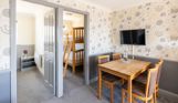Open plan living space in Chesil Beach apartments including bedrooms