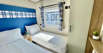 Internal of a caravan twin bedroom