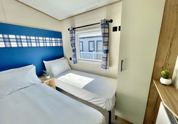 Internal of a caravan twin bedroom