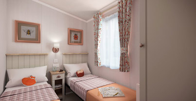 Internal of a caravan twin bedroom