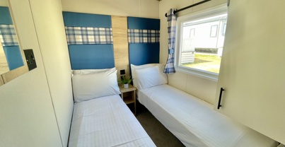 Internal of a caravan twin bedroom