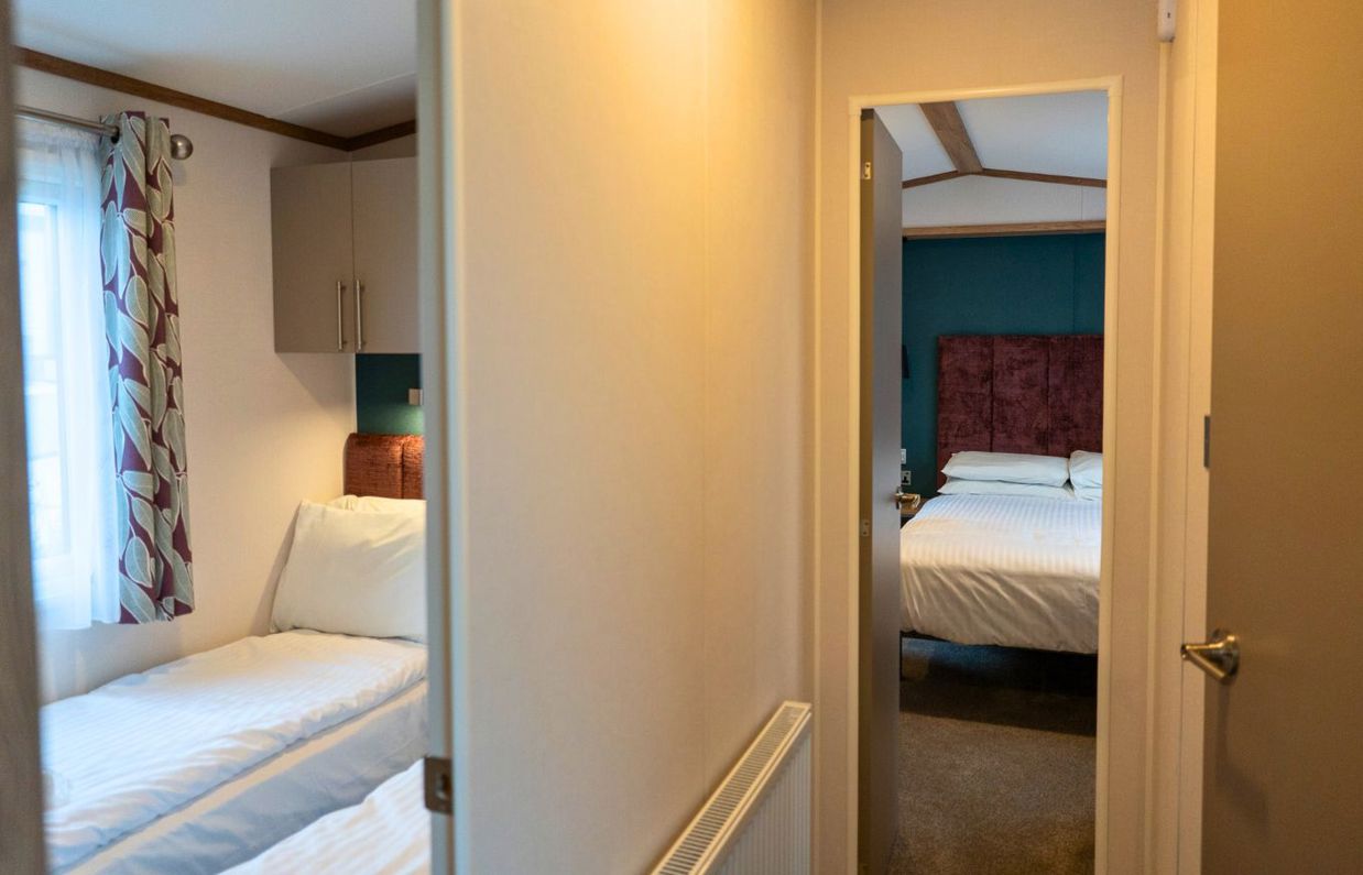 Internal of a caravan hallways with bedrooms