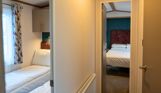 Internal of a caravan hallways with bedrooms