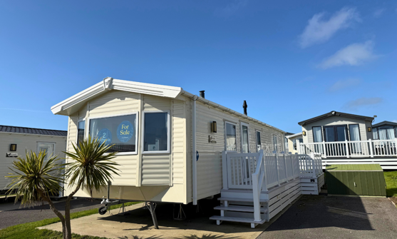 External of a caravan on pitch with decking