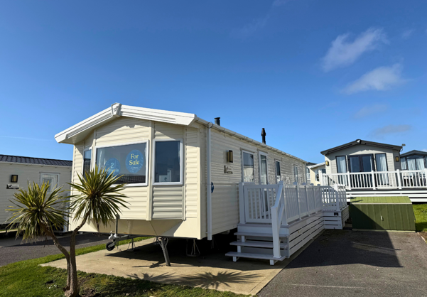 External of a caravan on pitch with decking