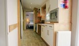 Internal of an accessible caravan open plan kitchen