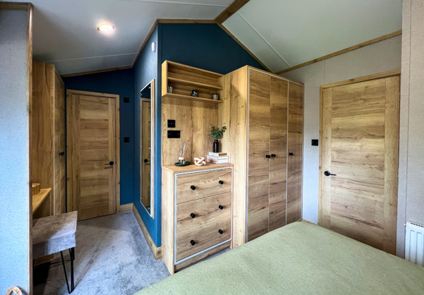 Internal of a caravan master bedroom dressing area