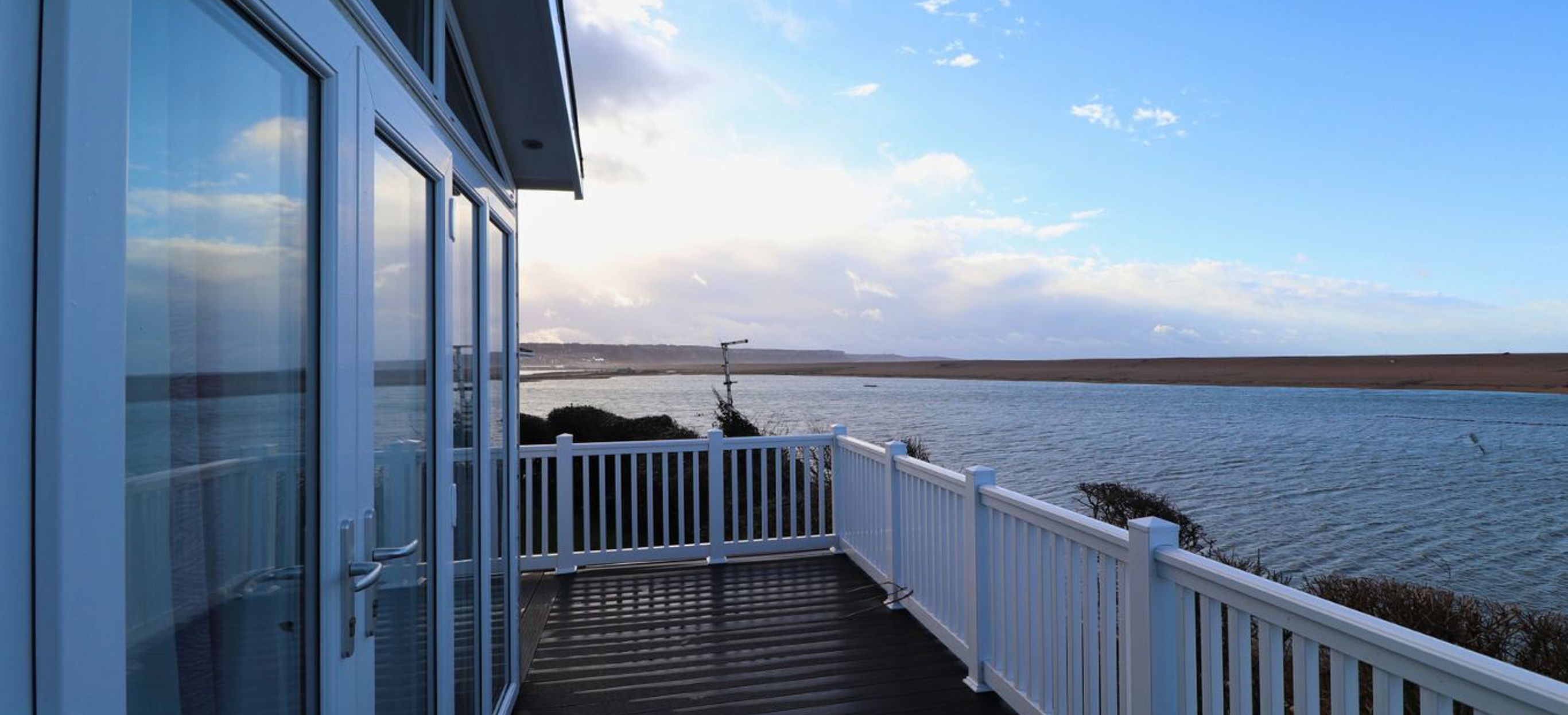 View from decking of sea and Chesil Beach