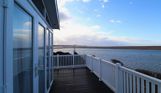 View from decking of sea and Chesil Beach