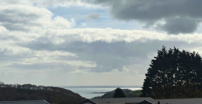 Views of the sea and Looe Island from a lodge