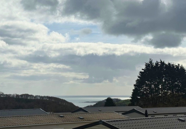 Views of the sea and Looe Island from a lodge