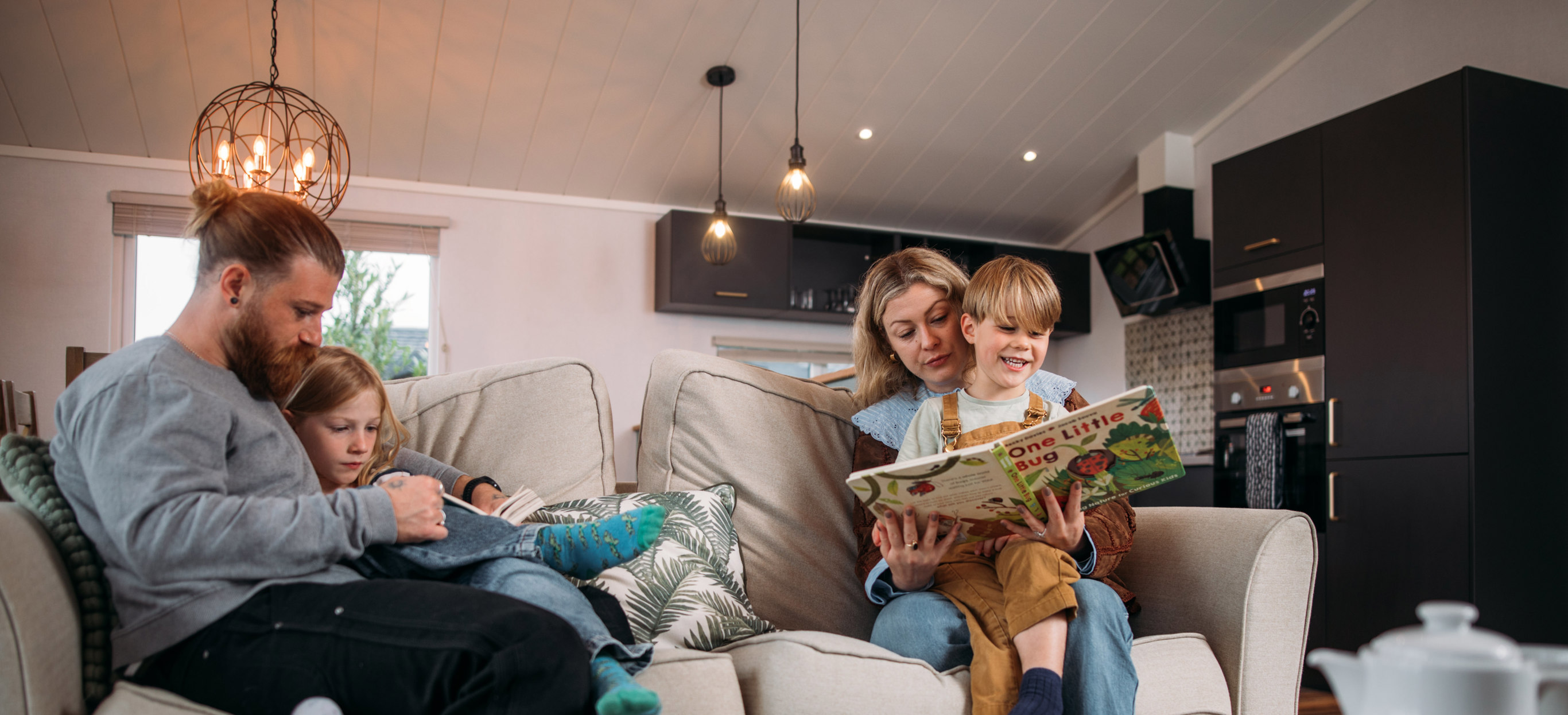 Family reading time in holiday home