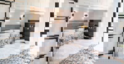 Interior of a Super Lodge Twin Bedroom with a Bunk Bed Overhead, sleeping 3