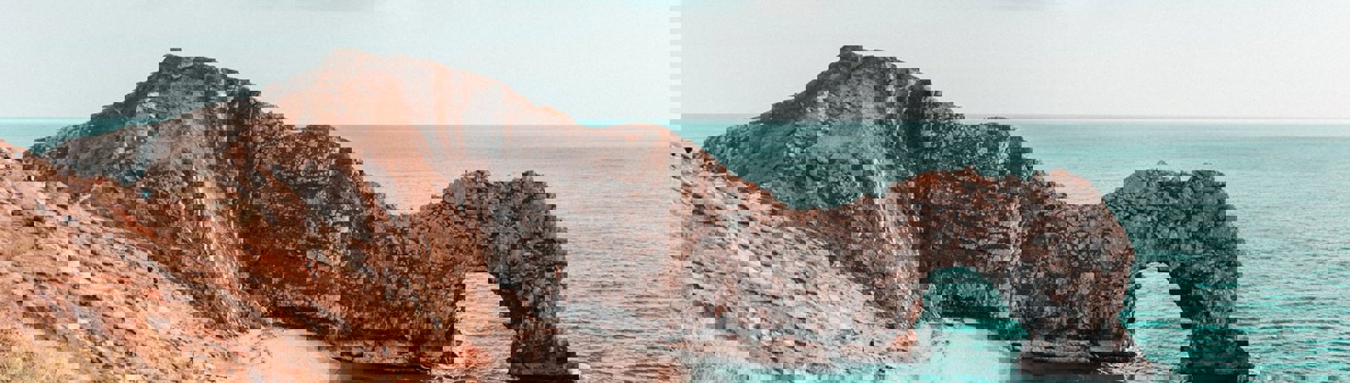 A dramatic limestone arch on the coast, Durdle Door