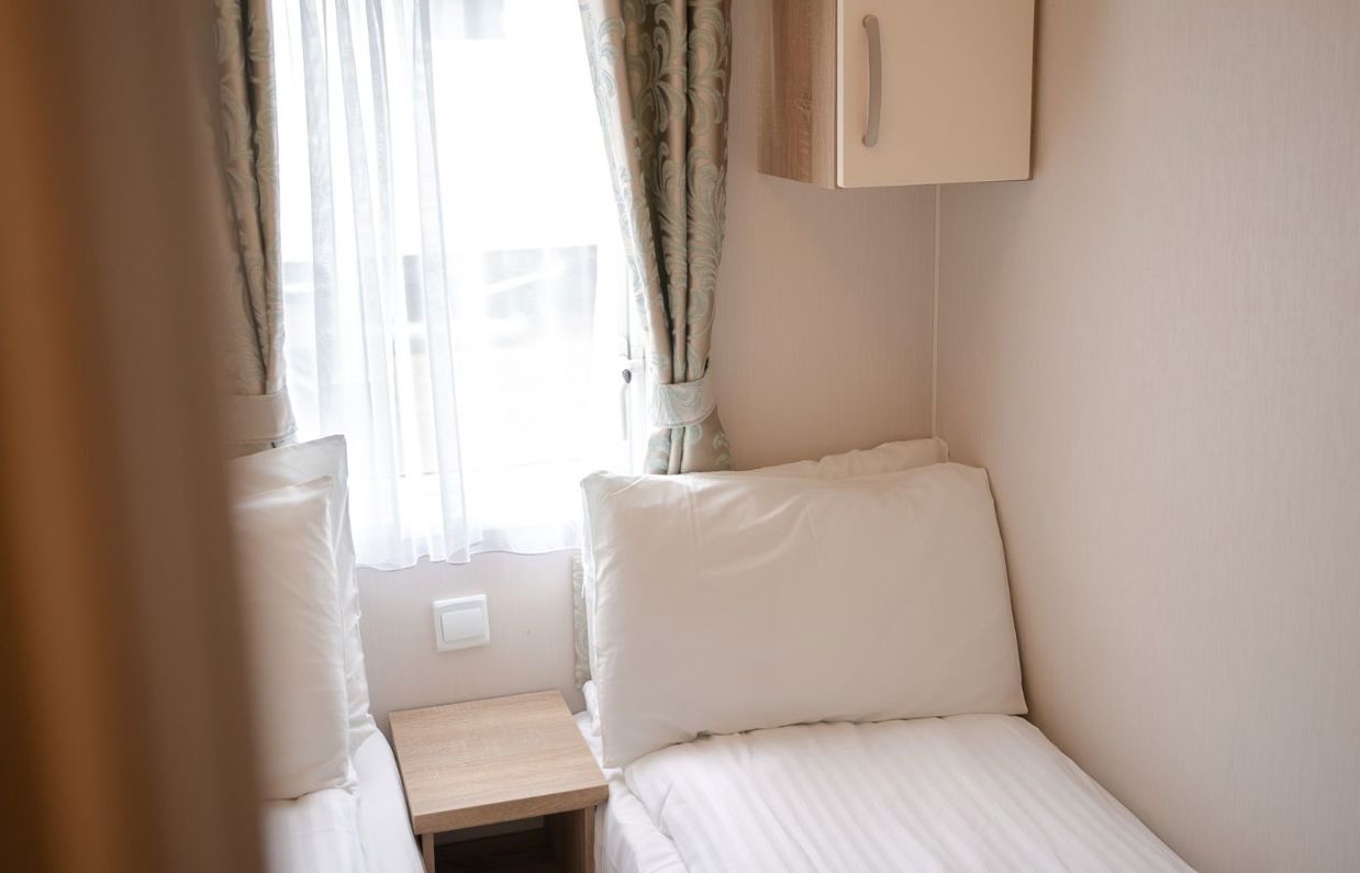 Internal of a caravan twin bedroom