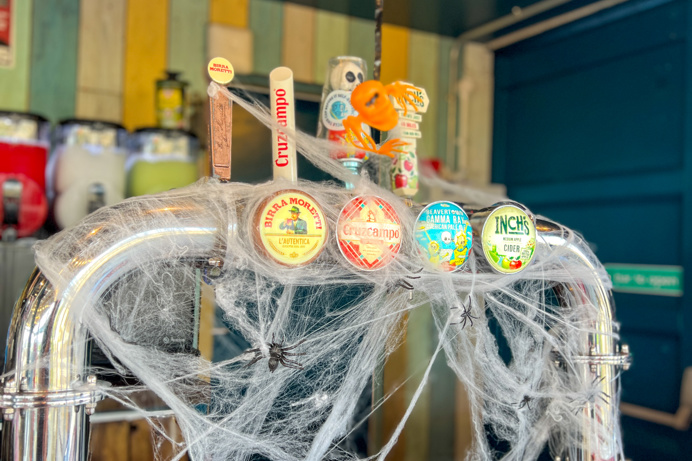 Cobwebs and spiders on a beer tap