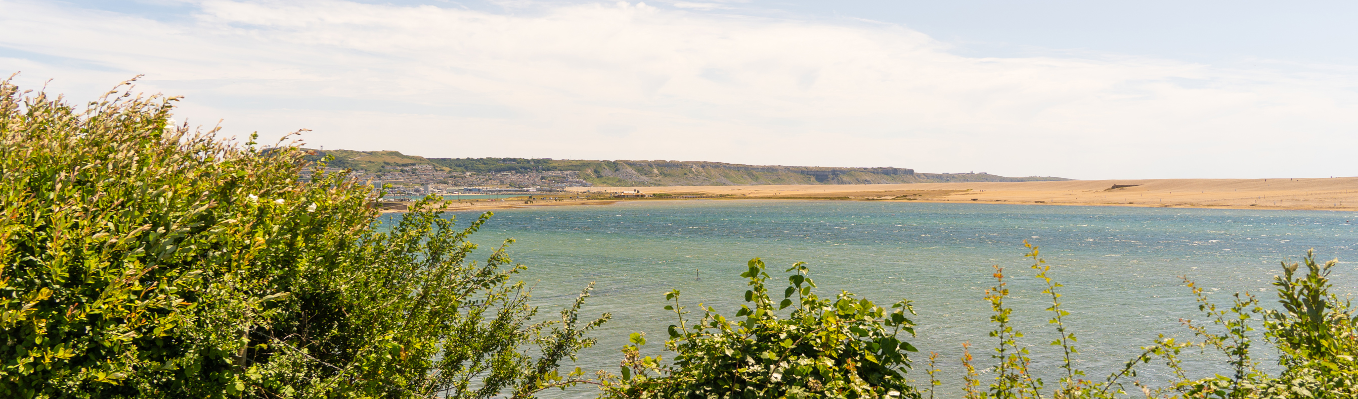 A view of the sea, Chesil Beach and Portland from the South West Coast Path