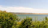 A view of the sea, Chesil Beach and Portland from the South West Coast Path