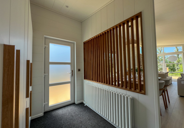 Internal of a luxury lodge entranceway with storage area