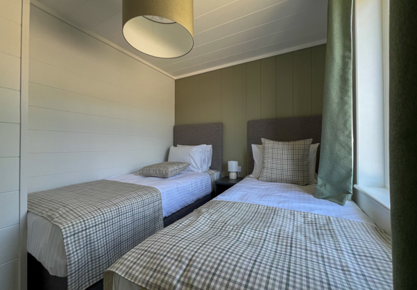 Internal of a luxury lodge twin bedroom