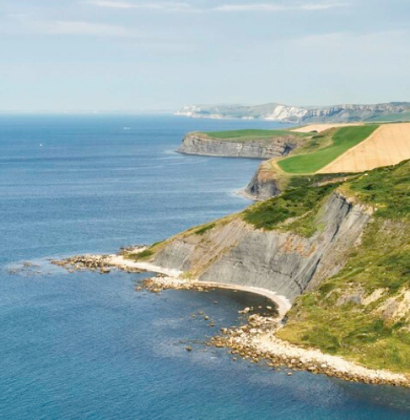 An image of the south west coast path with a screenshot of the waterside app overlayed