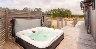 External of a luxury lodge with hot tub