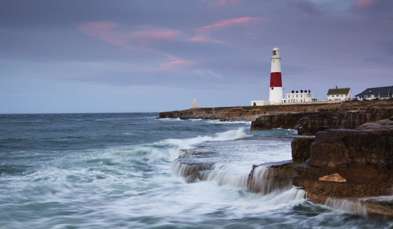 Dramatic, choppy seas at the southern tip of Portland with the Portland Lighthouse
