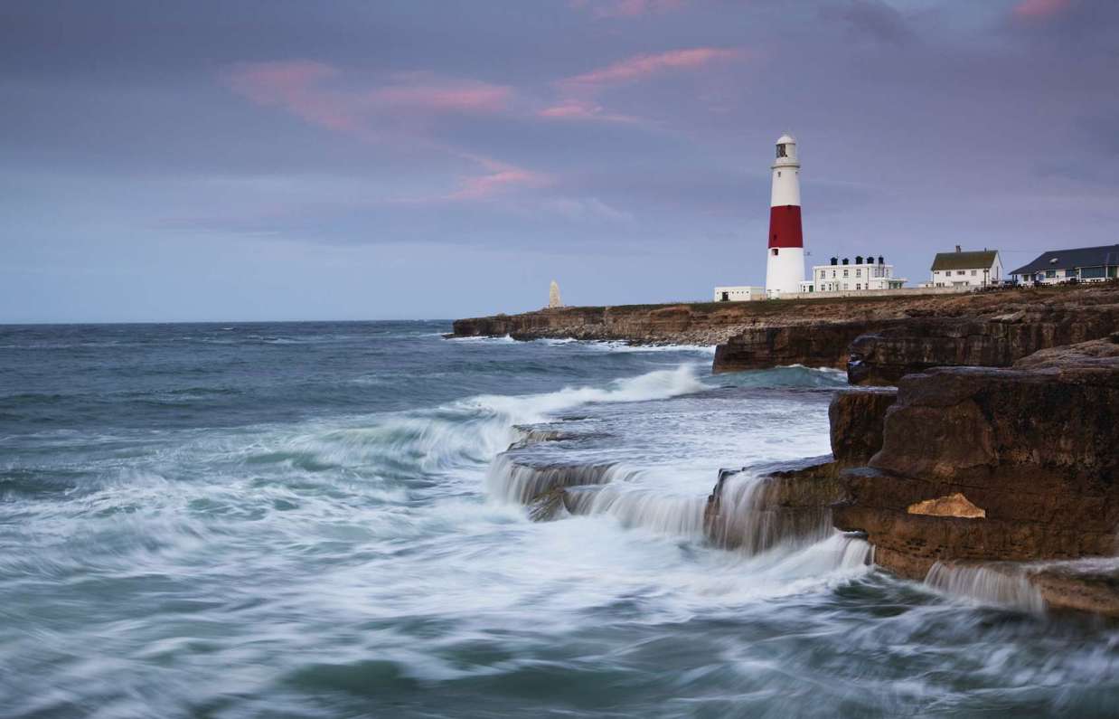 Dramatic, choppy seas at the southern tip of Portland with the Portland Lighthouse