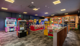 Internal of The Arena Sports Bar arcade with a range of different machines and games