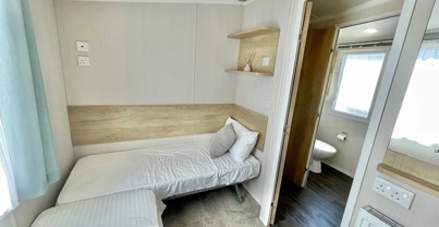 Internal of a caravan twin bedroom