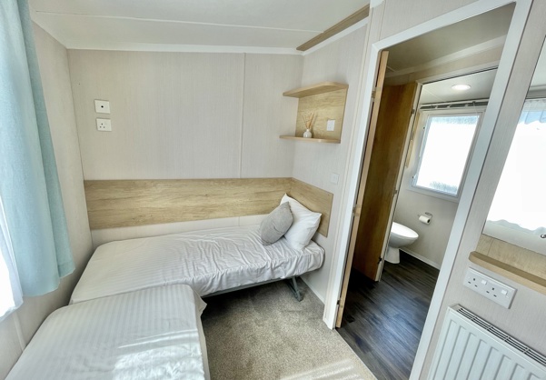 Internal of a caravan twin bedroom