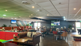 Family Room at Stargazy Bar & Grill with chairs & tables and TVs