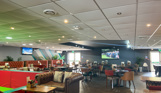 Family Room at Stargazy Bar & Grill with chairs & tables and TVs