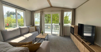Internal of a caravan lounge with decking