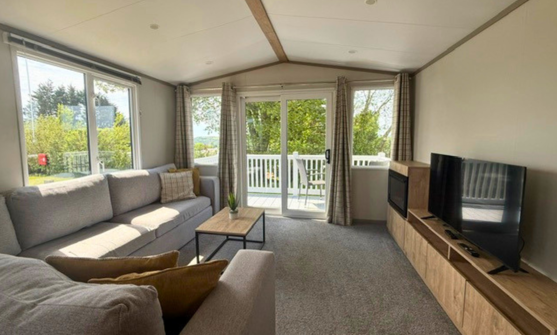 Internal of a caravan lounge with decking