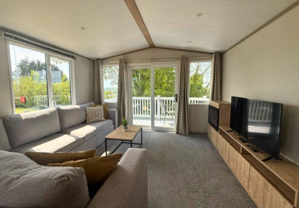 Internal of a caravan lounge with decking