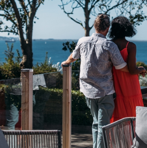 Couple at Osmington admiring their sea views