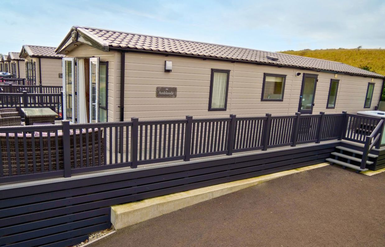 External of a caravan on pitch with decking