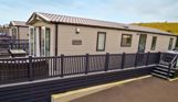 External of a caravan on pitch with decking