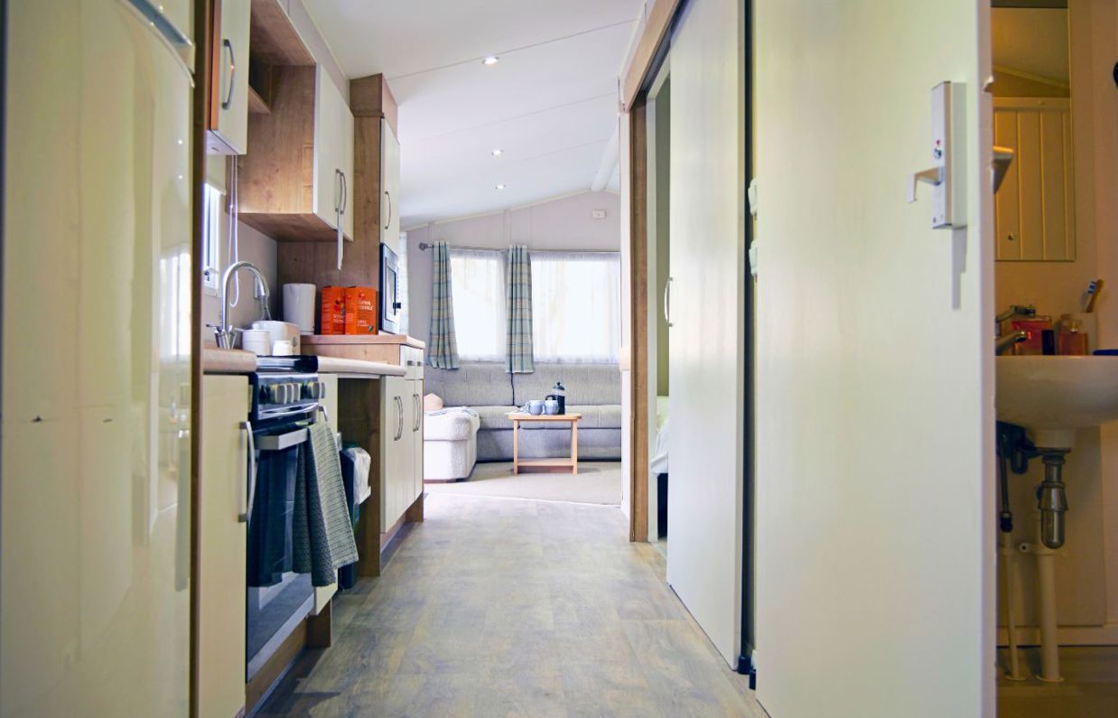 Internal overview of an accessible caravan open plan living space