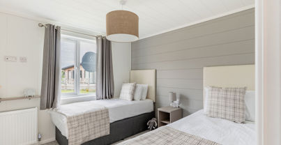 Internal of a luxury lodge twin bedroom