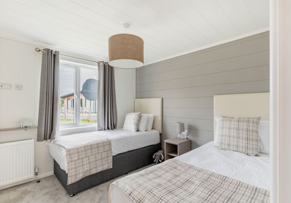 Internal of a luxury lodge twin bedroom