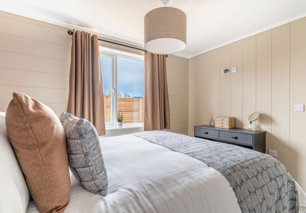 Internal of a luxury lodge master bedroom with dressing area