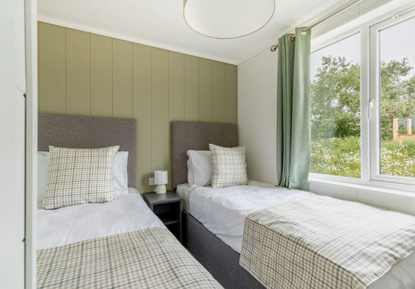 Internal of a luxury lodge twin bedroom