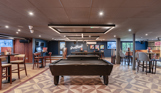 Internal of the Arena Sports Bar pool table and shuffleboard area