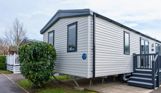 External of a caravan on pitch with steps