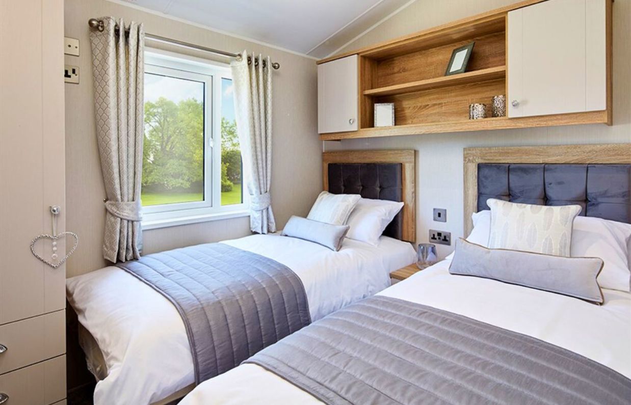 Internal of a caravan twin bedroom