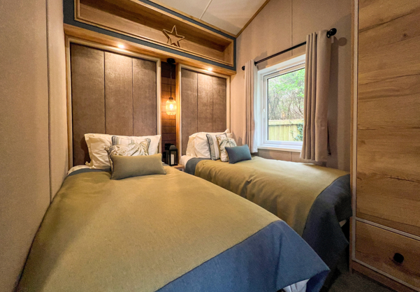 Internal of a caravan twin bedroom