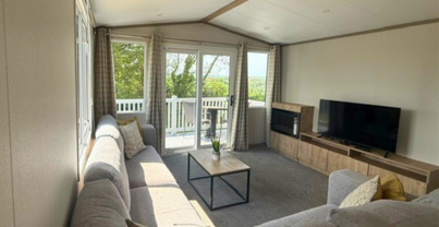 Internal of a caravan lounge with decking